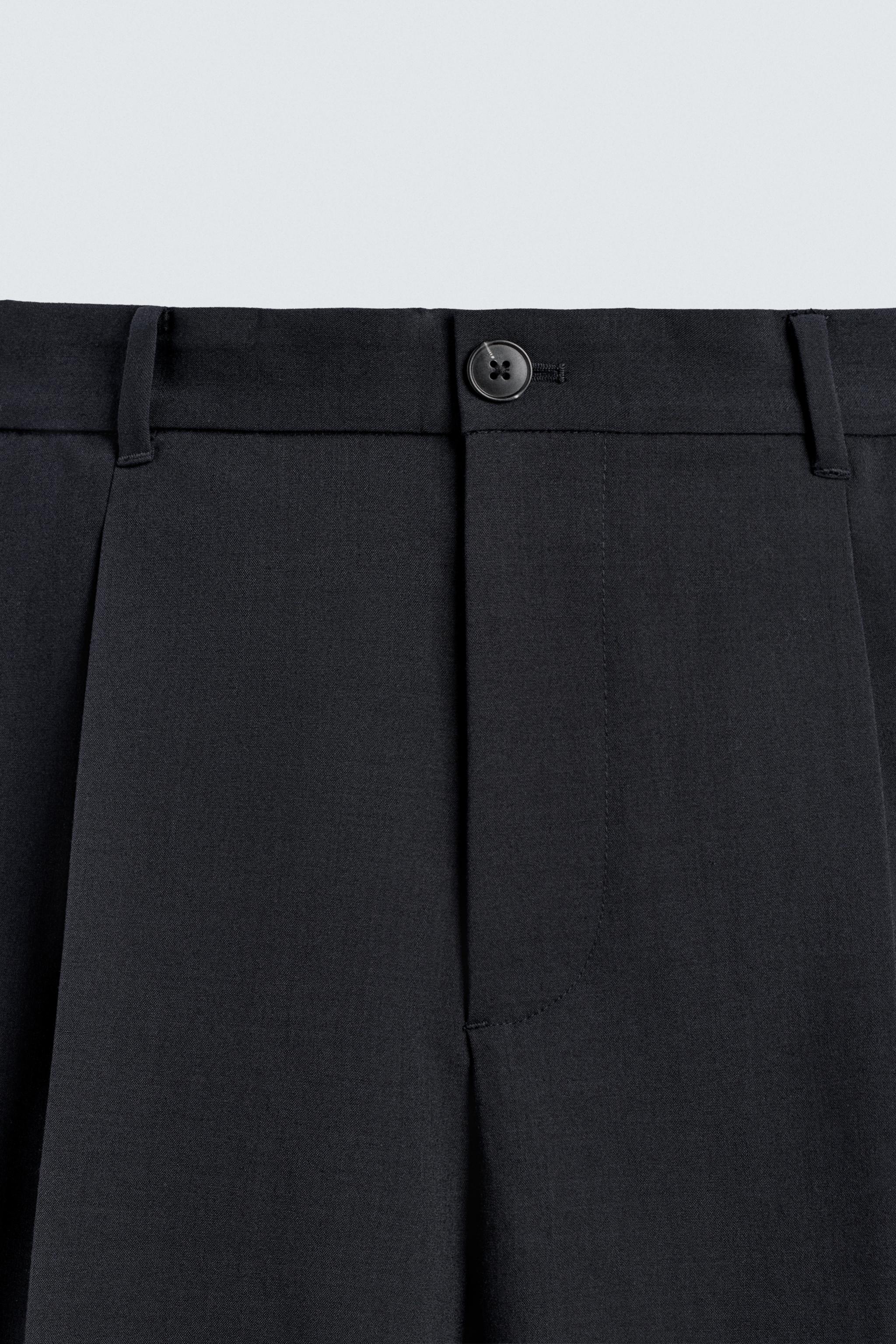 RELAXED FIT PLEATED SUIT SHORTS